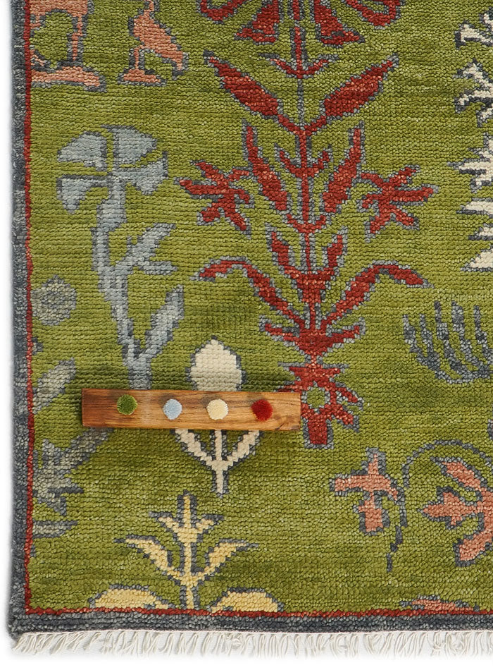 Lone Bloom Moss Garden Hand-Knotted Wool Rug